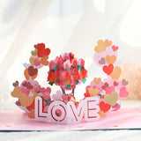 Pop-up card with heart designs and 'LOVE' text on a white background