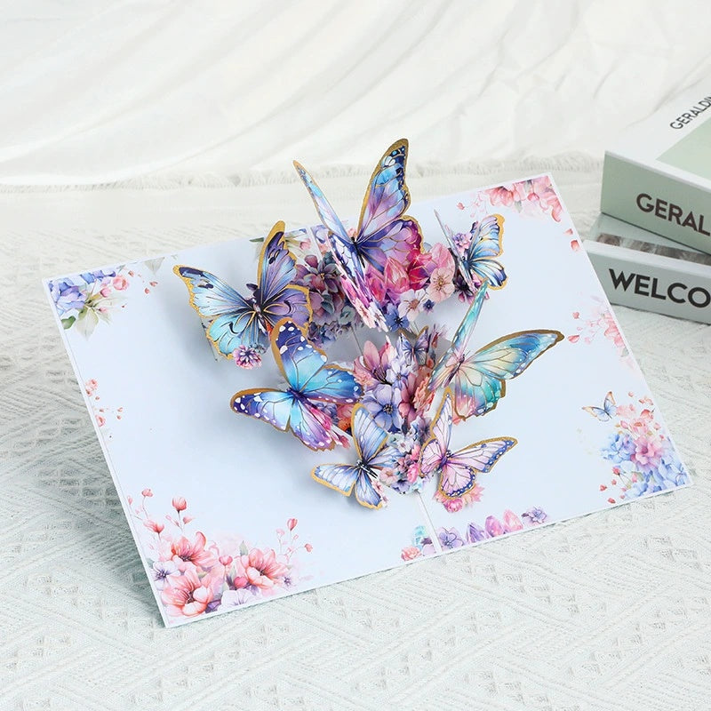 Card with colorful butterfly design on a white surface