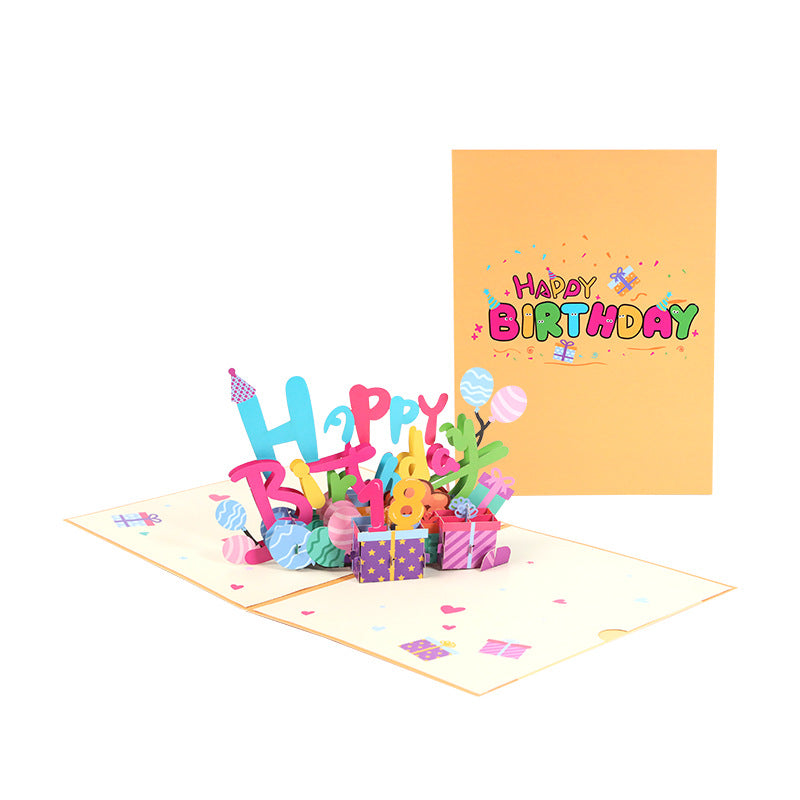A 3D pop-up birthday card with 'Happy Birthday' text, featuring a colorful mini bouquet of flowers.