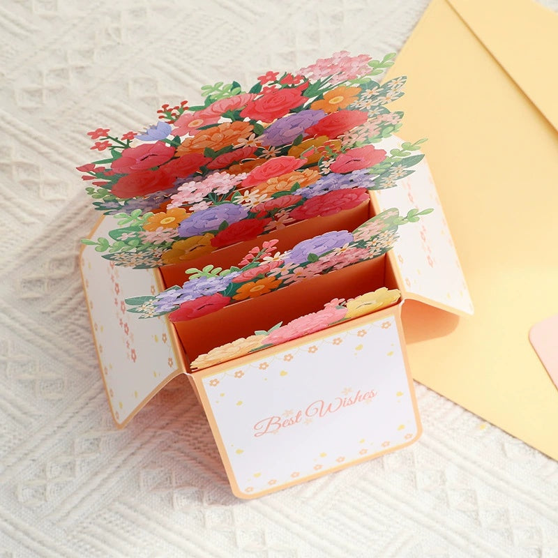 Greeting card with floral design and 'Best Wishes' text on a textured surface.