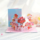Pop-up card with heart designs and 'LOVE' text on a white background