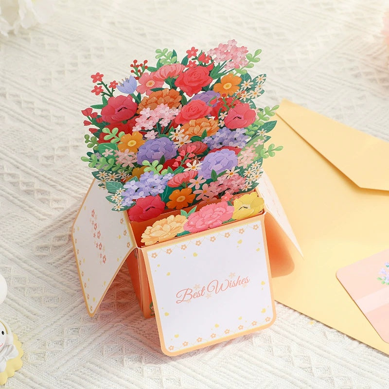 3D floral card with 'Best Wishes' text on a textured surface