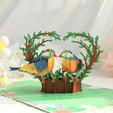 3D pop-up card with two birds in a heart-shaped tree