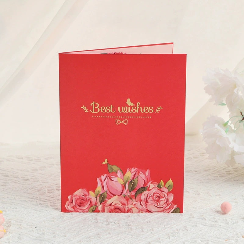 Red card with pink roses and 'Best wishes' text on a white background