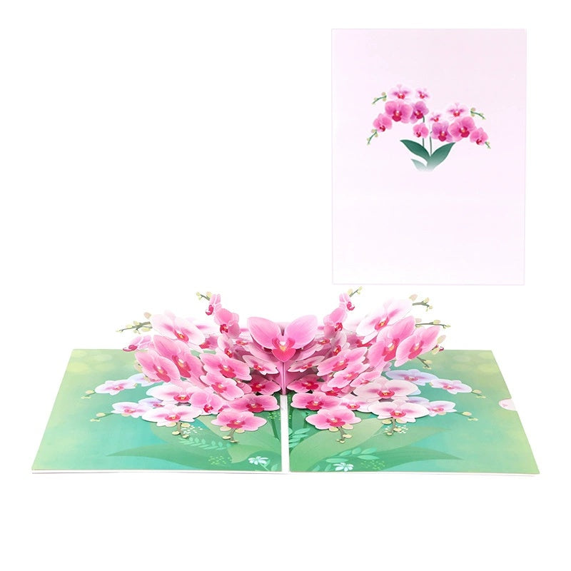 A 3D pop-up greeting card featuring a bouquet of pink phalaenopsis orchids when opened.