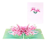 A 3D pop-up greeting card featuring a bouquet of pink phalaenopsis orchids when opened.