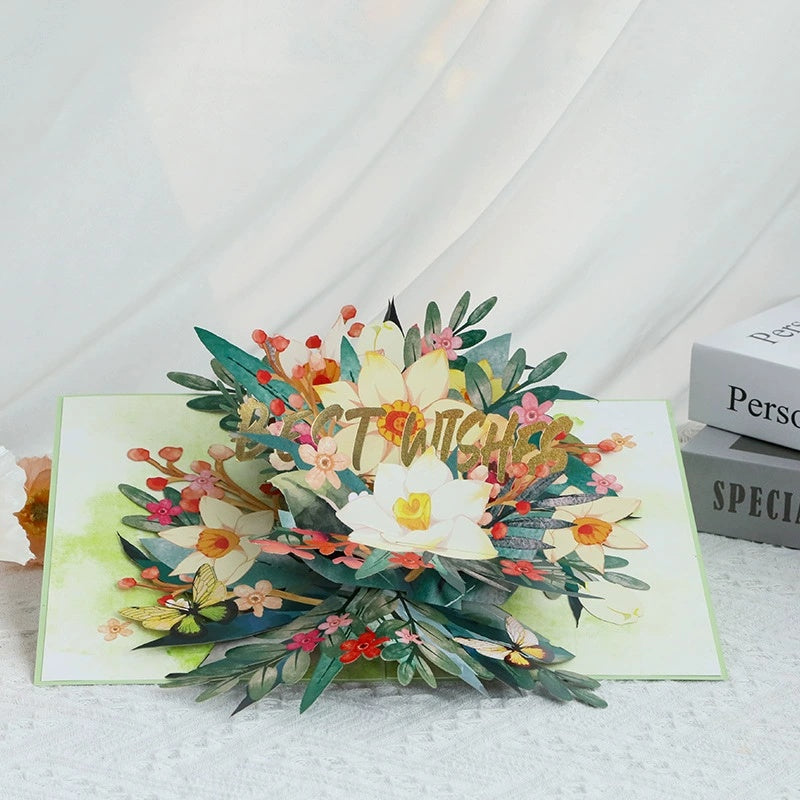 Pop-up card with floral design and 'Best Wishes' text on a white background