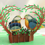 3D paper craft of two birds in a heart-shaped tree