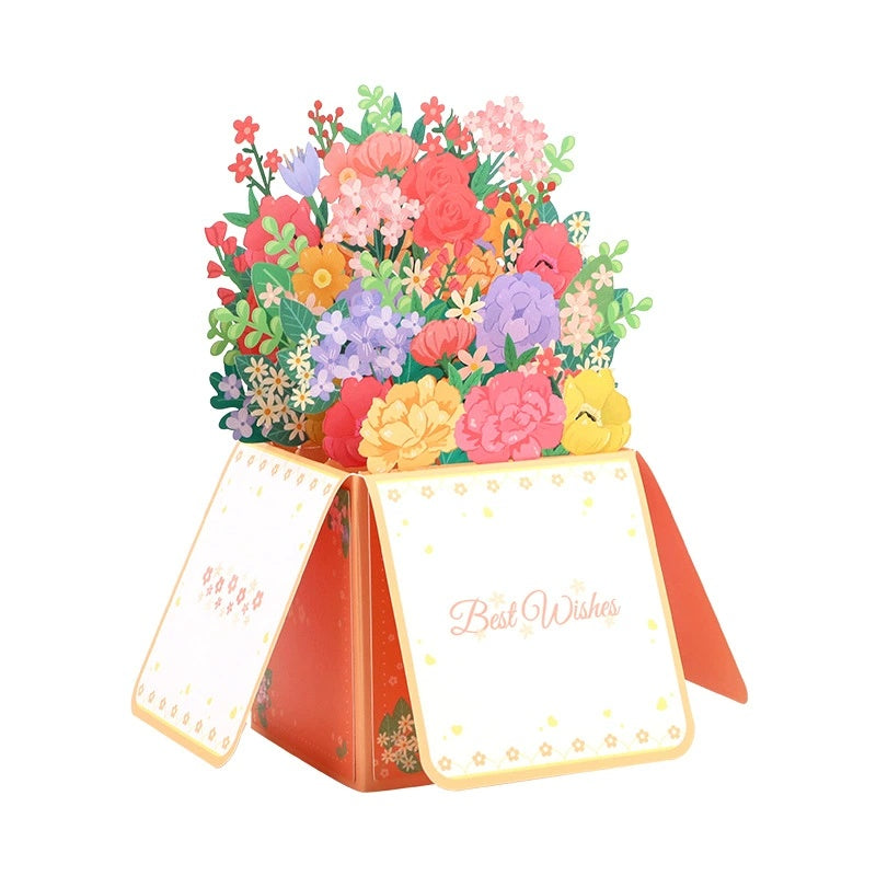 A 3D pop-up greeting card depicting a bouquet of colorful flowers bursting out of an open box with the words 'Bouquet' on the top.