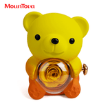 Ours en peluche jaune dégradé Mountova et fleur préservée avec collier caché